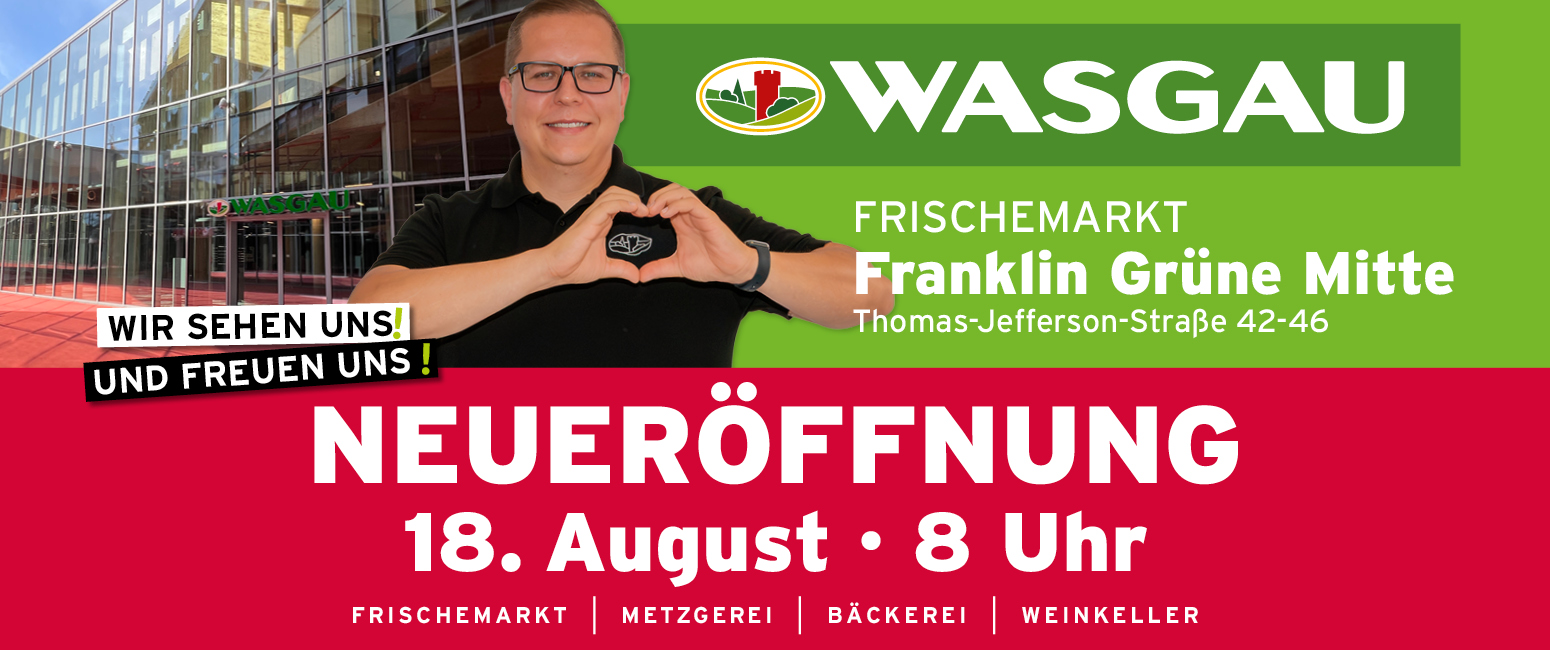 KI-basierte Bildbeschreibung | Ein Mann in einem schwarzen Hemd formt vor einem Geschäft mit den Händen ein Herz. Ein Schriftzug kündigt die Eröffnung des Wasgau-Supermarkts am 18. August um 8 Uhr morgens in der Franklin Grüne Mitte in Kaiserslautern an.